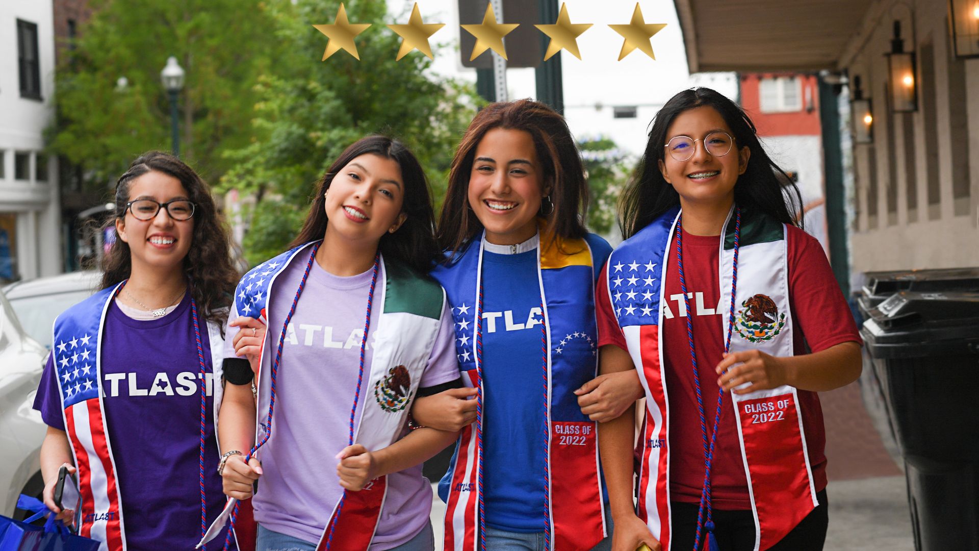Four Female Latino Students Outside Walking with five stars ATLAST Nonprofit McKinney Texas.